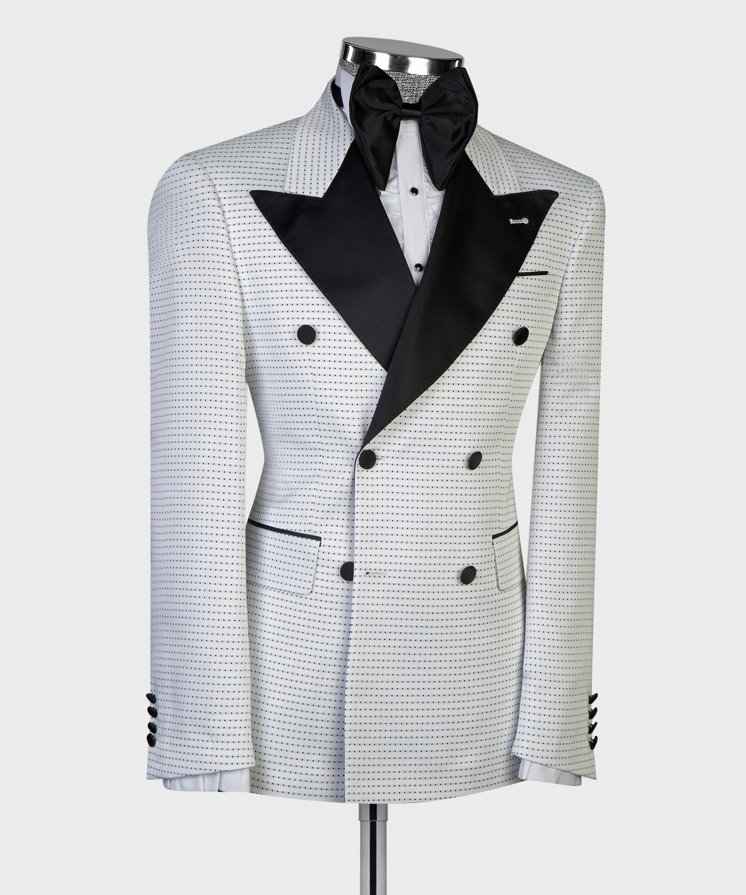 White tuxedo jacket with black lapels and bow tie